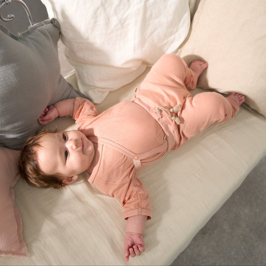 長袖ボディスーツ(スマイルコットン)ピンク 【日本アトピー協会推薦品】|ベビー服